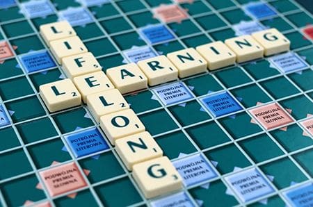 scrabble piecing spelling out lifelong