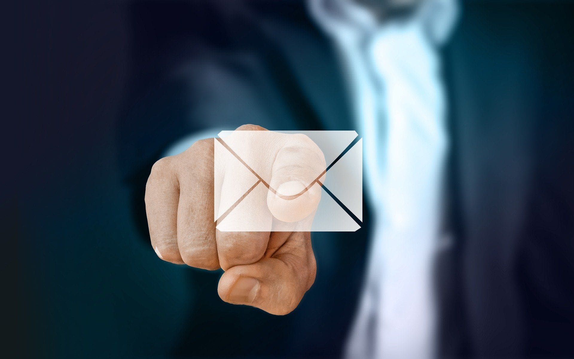 Man pointing at email icon Man pointing at email icon